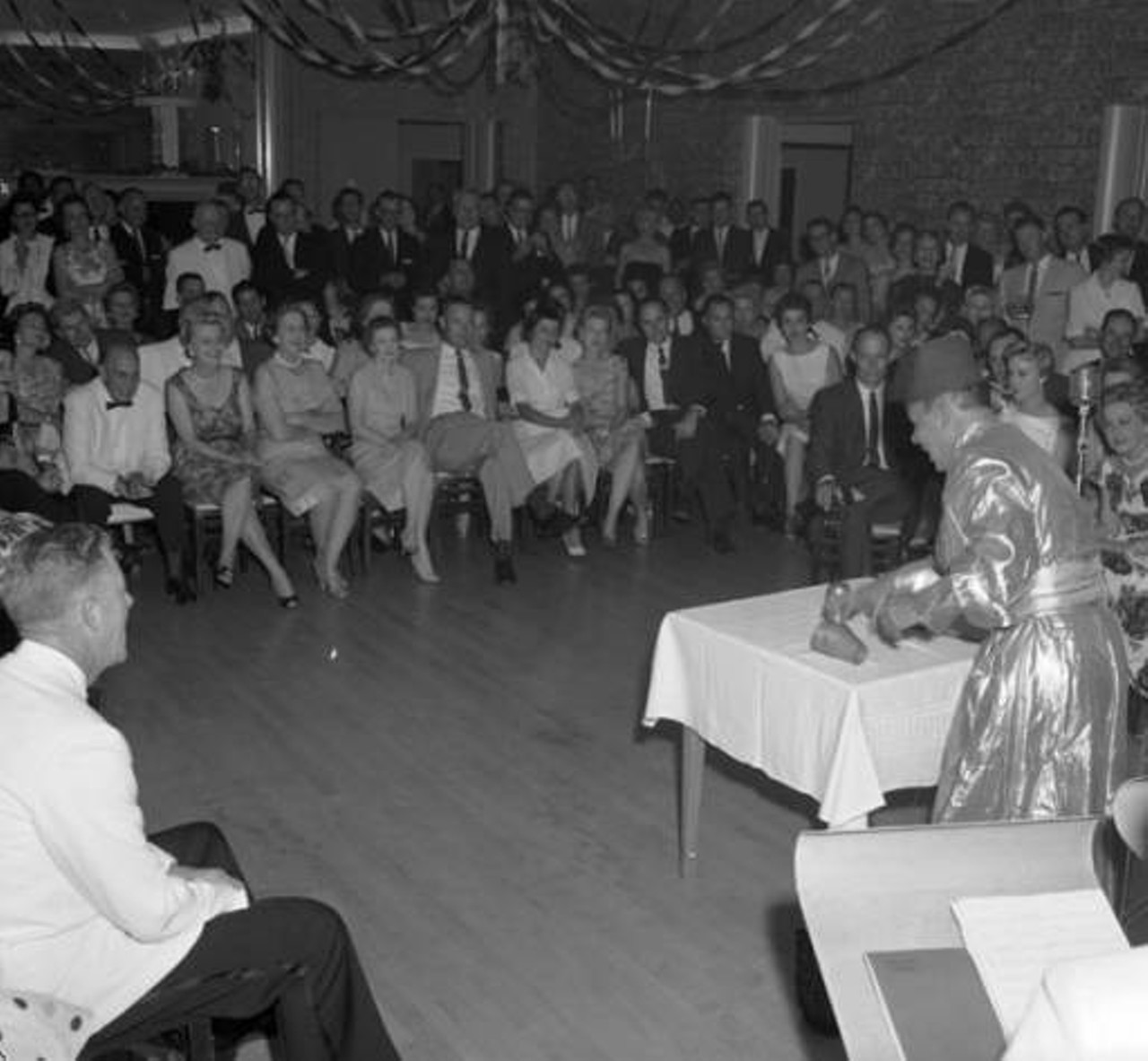 Magician Performing for the Oak Hills Country Club, 1959
The Oak Hills Country Club has been part of San Antonio since 1921, having been originally named “Alamo Country Club.” After it reopened after the Great Depression and World War II, the name was changed to Oak Hills Country Club. Since then, the Country Club has been home to many events.
Photo via Zintgraff Studio Photo Collection