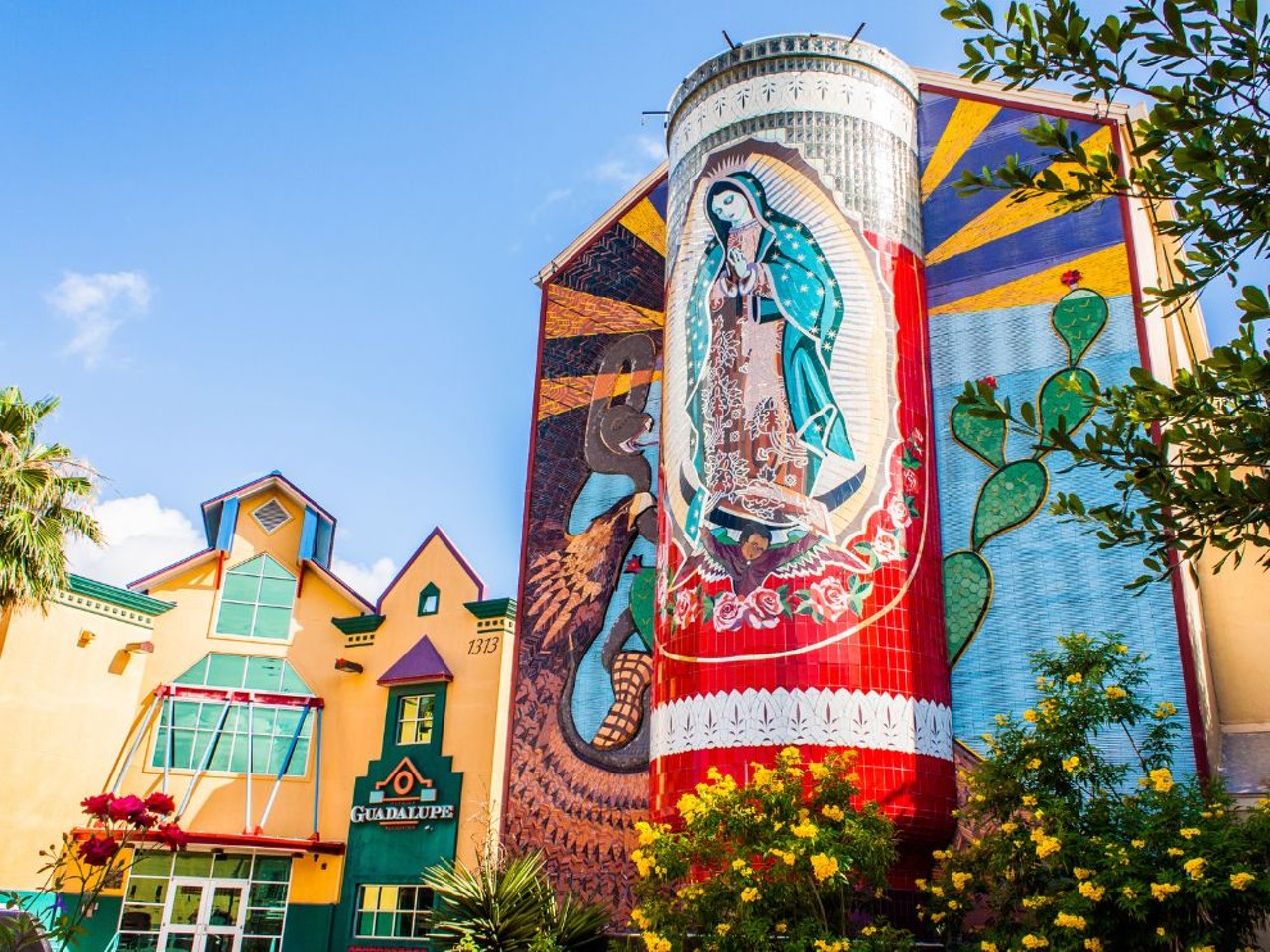 La Veladora of Our Lady of Guadalupe
1301 Guadalupe St., San Antonio
Located at Plaza Guadalupe, Jesse Treviño's La Veladora of Our Lady of Guadalupe is mixed media mural featuring a 3D votive candle with an eternal flame facing Guadalupe Street. It is said to be the world's largest Virgin Mary mosaic.