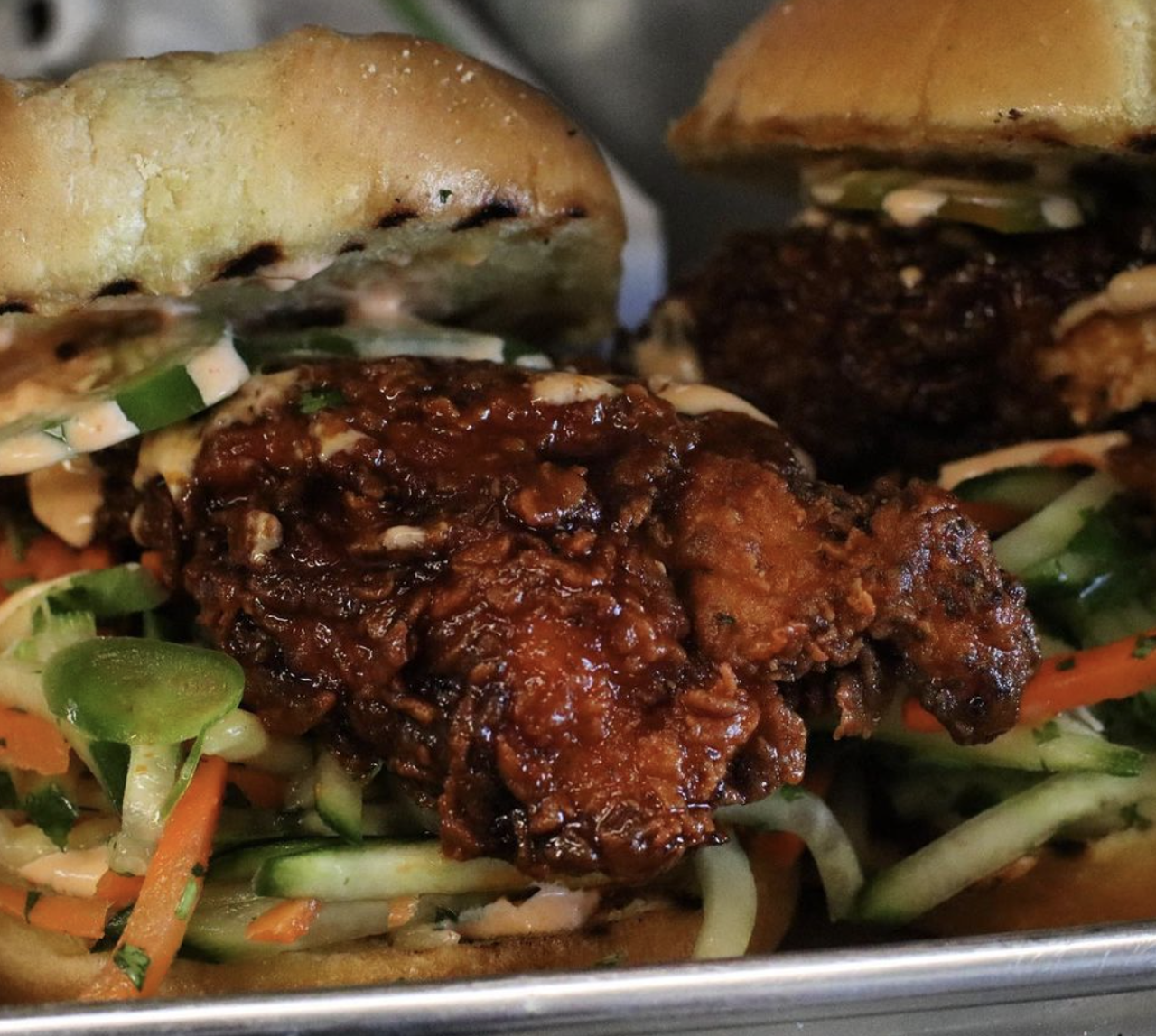 Goldfeather 
834 NW Loop 410 Suite 106, (210) 342-2473,  goldfeatherbb.com 
In an unconventional twist, Goldfeather’s Bun Mi Fried Chicken brings the unique flavors of a bahn mi to the fried chicken sandwich. Two titans of flavor — one convenient sandwich!  
Photo via Instagram / goldfeatherbb