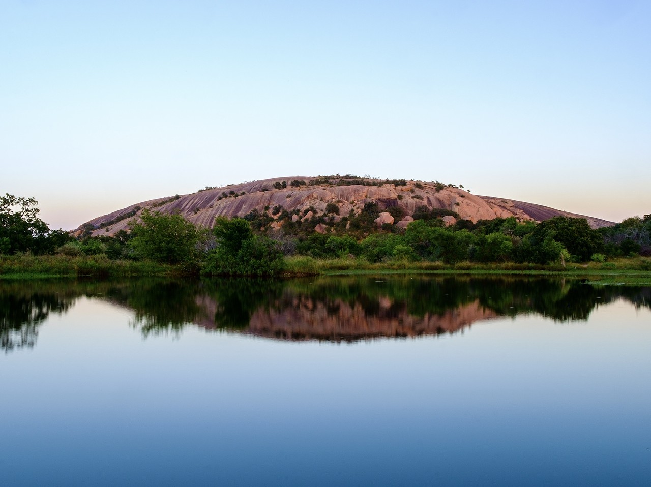 Enchanted Rock State Natural Area
16710 Ranch Road 965, Fredericksburg, (830) 685-3636, tpwd.texas.gov
Climbing the pink granite dome of Enchanted Rock is a local right of passage for local outdoors enthusiasts. Beyond its namesake, this park also offers camping, hiking, rock climbing and amazing stargazing views.