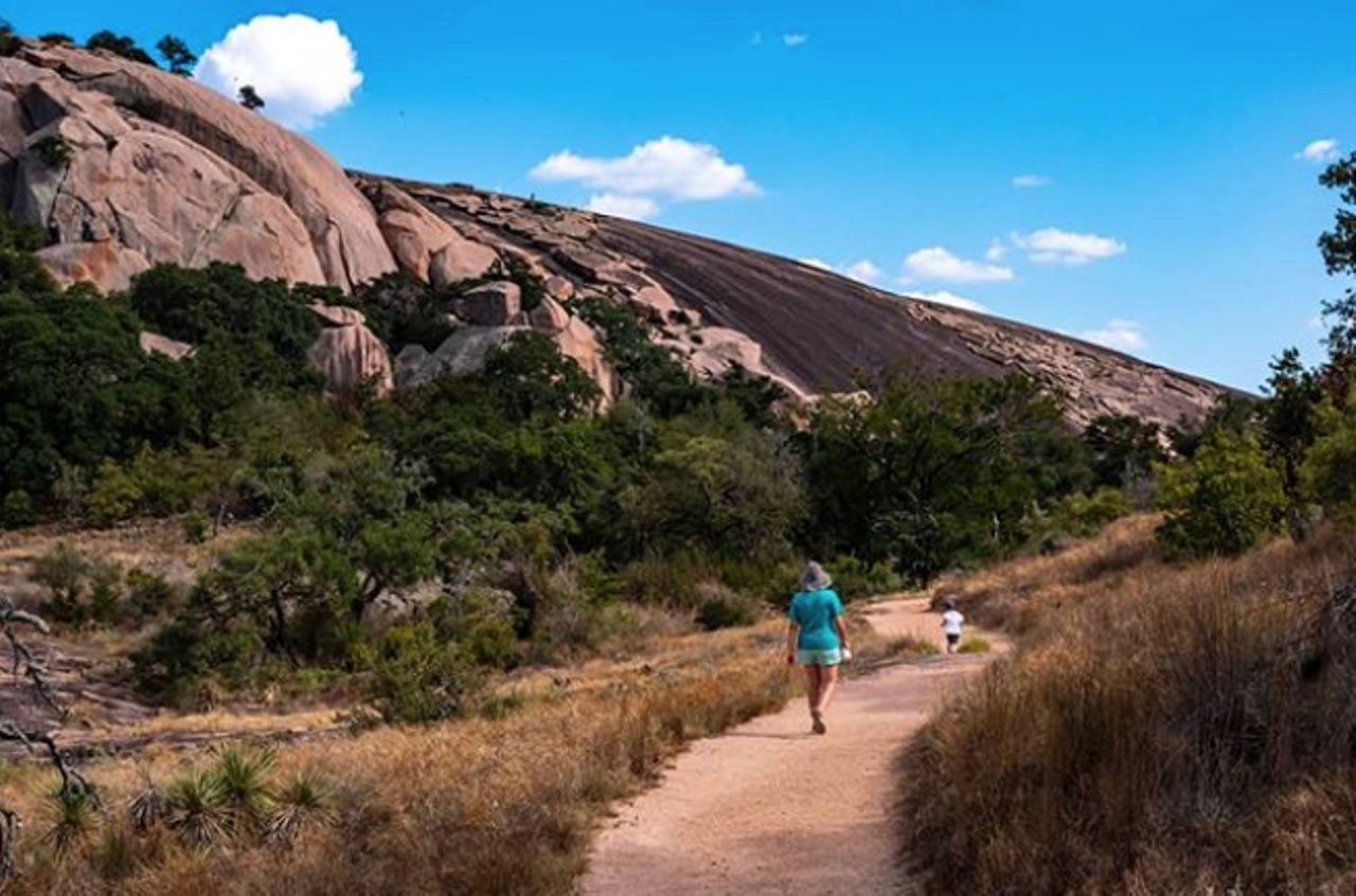 Enchanted Rock Natural Area
16710 Ranch Road 965, Fredericksburg, (830) 685-3636, tpwd.texas.gov
Climbing Enchanted Rock is a local rite of passage. “What makes Enchanted Rock so special?” you may ask? It’s a pink granite mountain, that’s what, and it’s the biggest one in the United States. If you're looking to make a weekend of it, you can camp at the park, or stay in nearby Fredericksburg if you don't want to leave civilization completely behind. 
Photo via Instagram / danielmillering