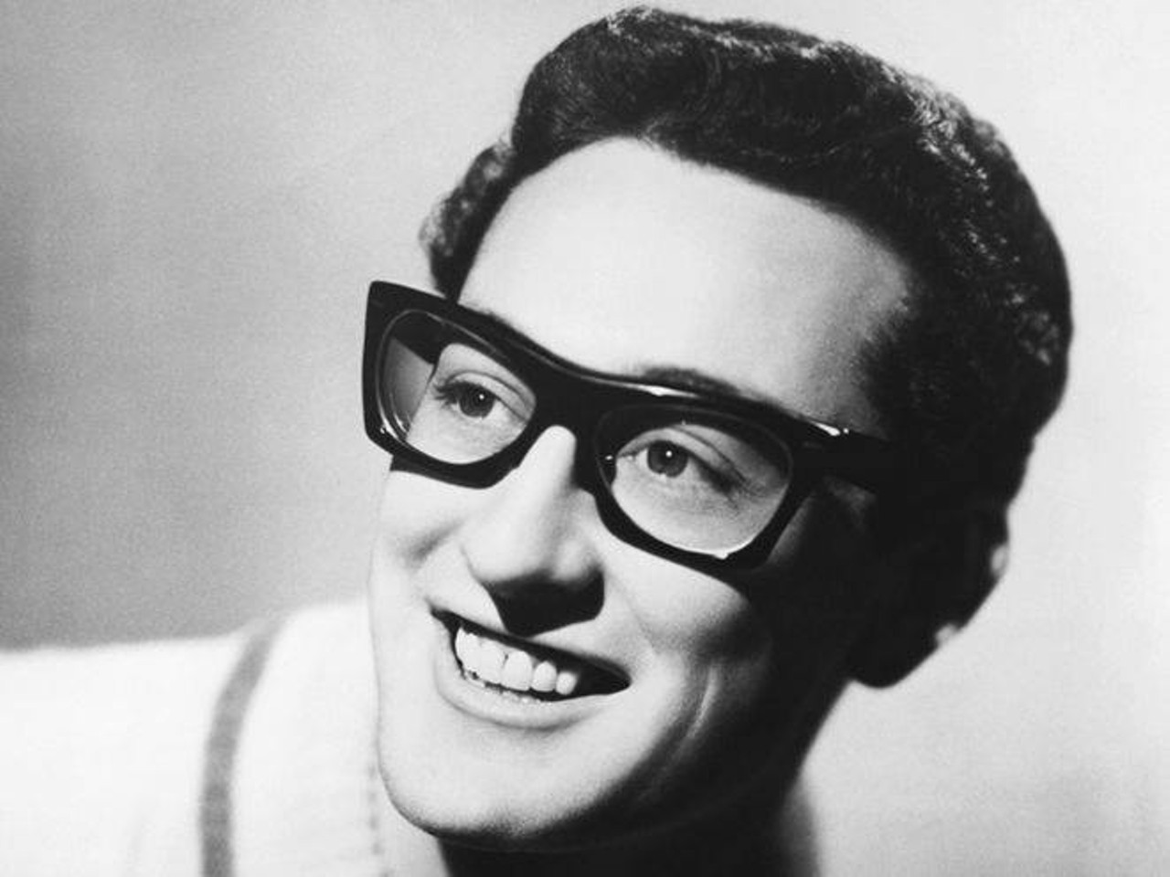 Buddy Holly
Though he led an incredibly short life, there is still too much importance and influence to be described here. Born in Lubbock during the Great Depression, Holly would eventually change the music scene, even though he died at age 22. After gaining popularity and opening for Elvis numerous times in the mid-50s with a friend and fellow musician, Bob Montgomery, Holly decided to pursue a serious career in music. During the mid- to late-50s, he and his band were credited with hits such as “That’ll be the Day,” “Rave On” and “Peggy Sue.” His death occurred in 1959 when he after a plane crash left no survivors. This event is now known as “the day the music died,” and is alluded to in Don McLeans’ song “American Pie.” He is buried in the City of Lubbock Cemetery.
Photo via Facebook / Buddy Holly
