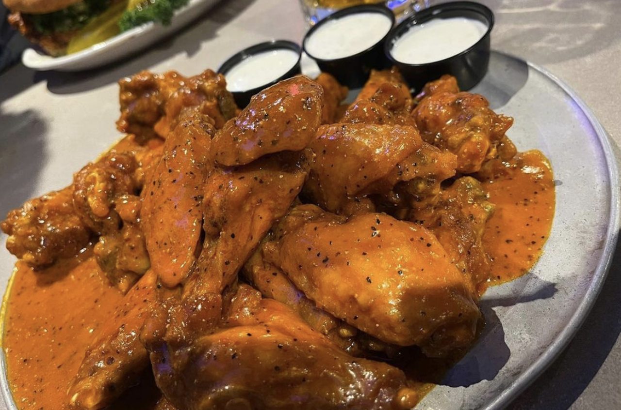 Pluckers
Multiple Locations, pluckers.com
This Austin-based chain is all about wings, and the possibilities are endless. Try Vampire Killer, Buffalo Hot or Gochujang to heat things up. Just don’t forget to complete your meal with an order of macaroni and cheese.
Photo via Instagram / pluckerswingbar