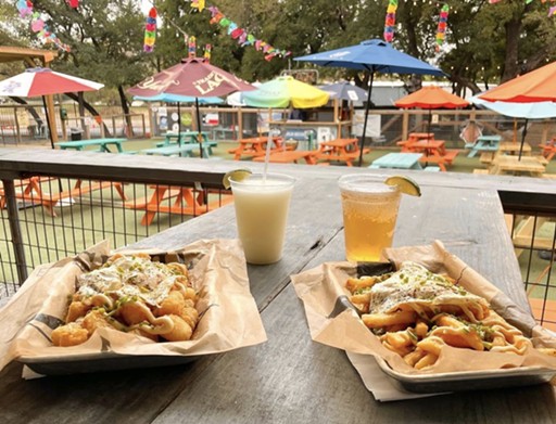Hops & Hounds
13838 Jones Maltsberger Rd, (210) 592-9400, hopsandhoundsllc.com
This Northeast patio offers a delicious basket of loaded tots on which to nosh while you grab a drink and play some good ol’ fashioned corn hole with your friends.
Photo via Instagram / hopsandhoundssa