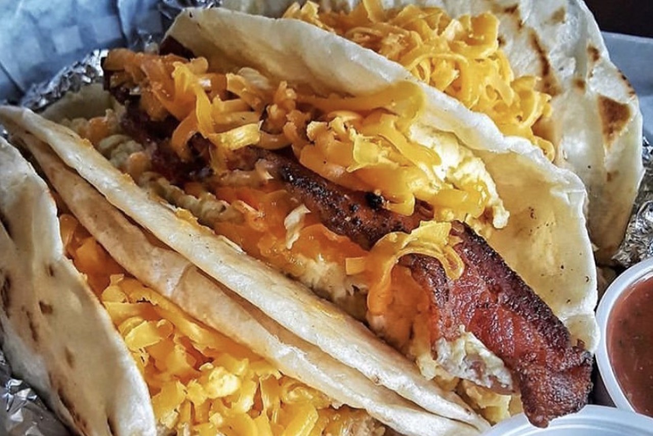 Breakfast tacos may shave a few years off our lives, but they're totally worth it.
Photo via Instagram / lostacosgueros
