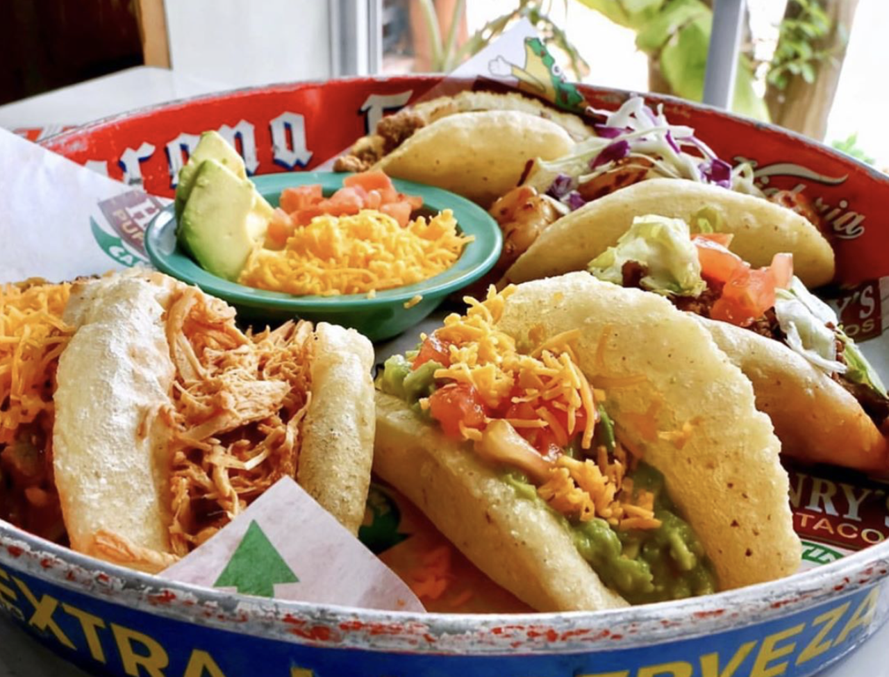 Henry’s Puffy Tacos
Various Locations, henryspuffytacos.com
Every San Antonian has their go-to puffy taco joint, so we’d be remiss not to feature a few. Henry’s Puffy Tacos is offering their full menu, family meals and alcohol to-go with drive-thru service at both locations and delivery via  Postmates and DoorDash. 
Photo via Instagram /  
henryspuffytacos