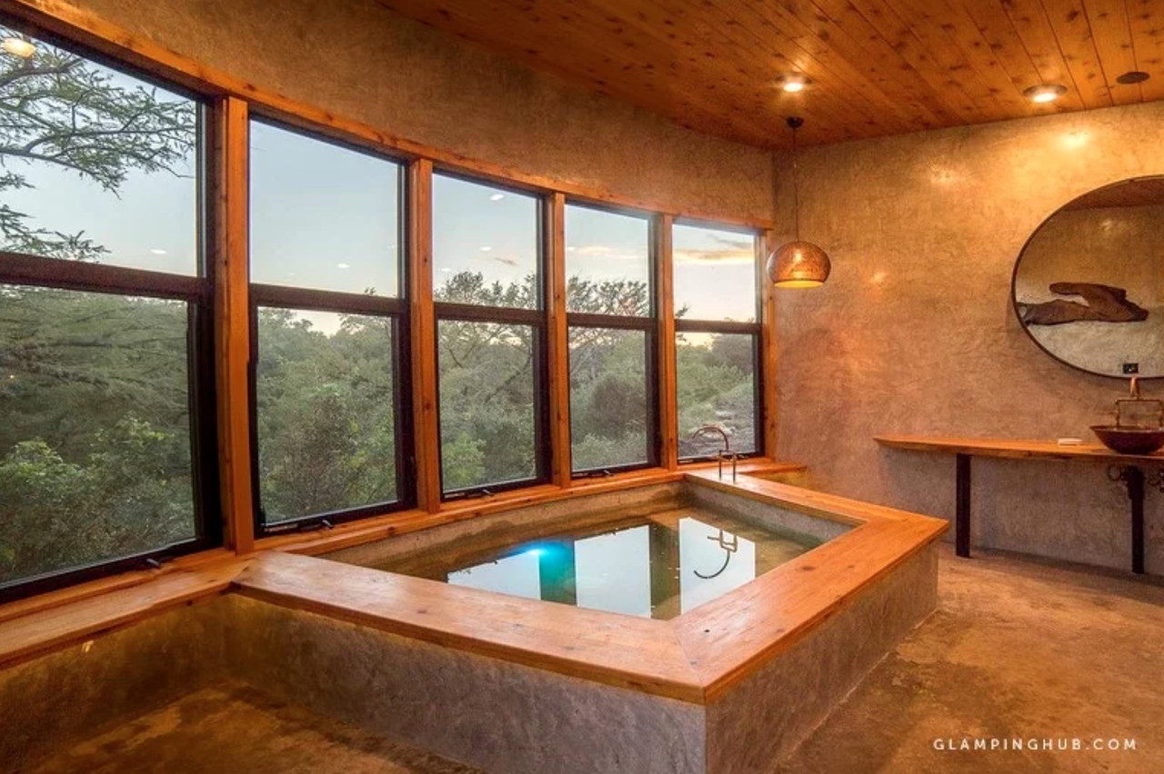 The top draw of this rental may just be this tub, where you can relax and enjoy the natural views.