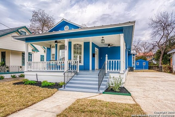A newly renovated 1912 Craftsman home near King William is all about its vibrant blue and sweet porch