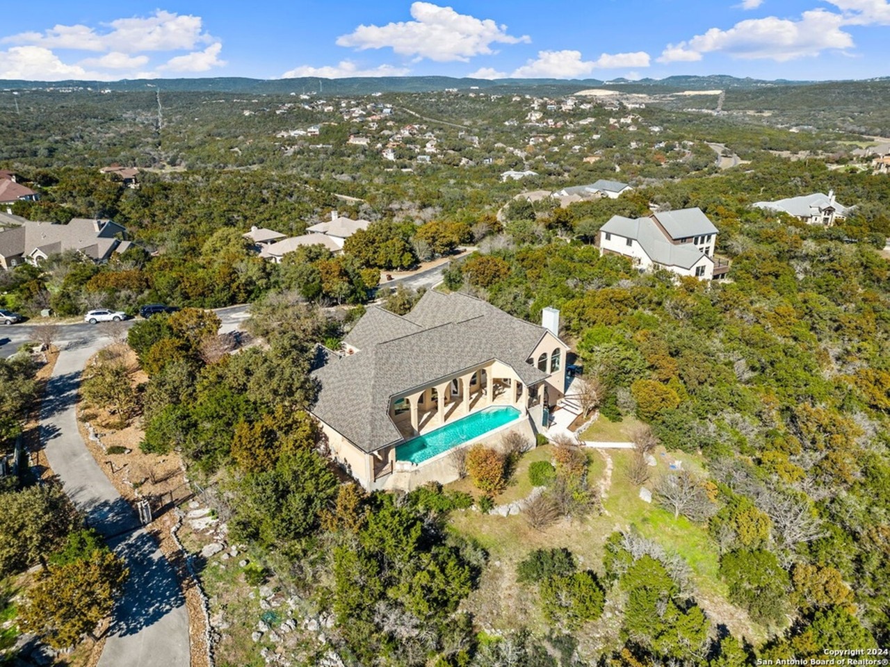 A San Antonio home for sale has windows offering panoramic Hill Country