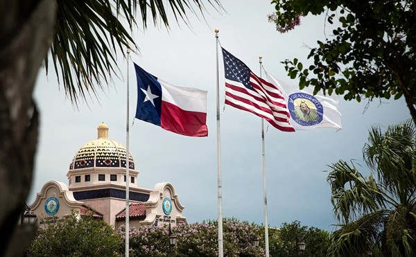 Flags fly over Rio Grande City Hall in 2021. Town officials say they have a backlog of public records requests due to an unprecedented volume of requests from a city commissioners candidate.