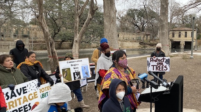Environmental advocates gather in Brackenridge Park after the city agreed to delay a project that would fell dozens of trees there.