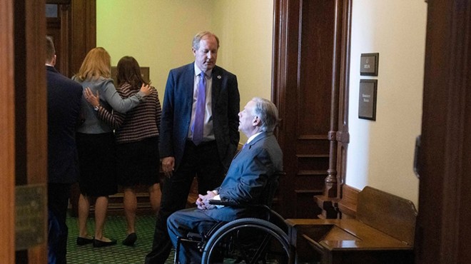 Opening Day action of the 88th Texas Legislature at the Texas Capitol showing Attorney General Ken Paxton conferring with Gov. Greg Abbott outside the Senate chamber before his swearing in ceremony in Jan. 10, 2023.