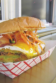 An ooey-gooey egg finishes this American banh mi