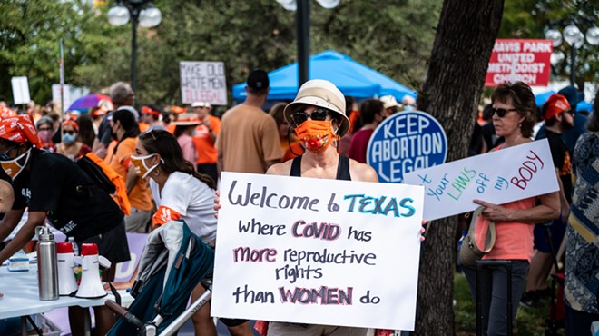 Women protest Texas' near-complete ban on abortion during a march in San Antonio last year.