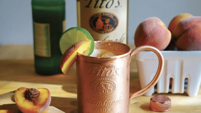 Peach-infused Tito’s Vodka and Ginger Beer complete Twin Liquors' Peach Mule cocktail combo.