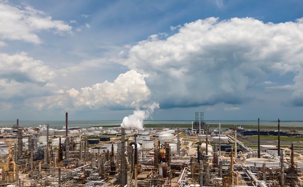 An oil refinery sprawls along the Texas Gulf Coast.