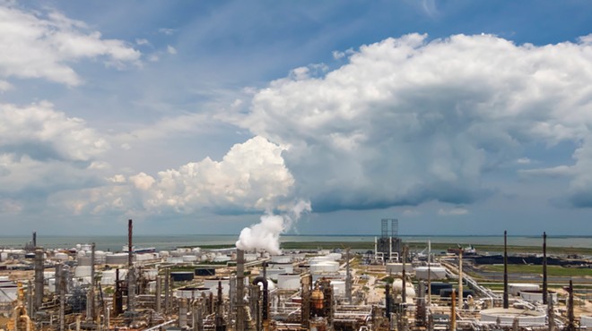 An oil refinery sprawls along the Texas Gulf Coast.