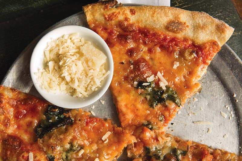 Barbaro’s pizza with taleggio, hash browns, kale and honey - Ana Jenkinson