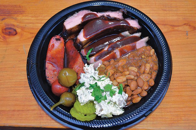 Brisket, beans, potato salad, sausage, ribs, and pickled peppers - SCOTT ANDREWS