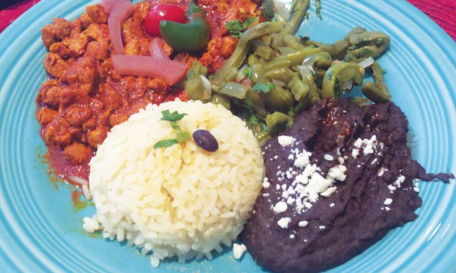 Cascabel's Cochinita pibil, served with white rice and black beans - SCOTT ANDREWS