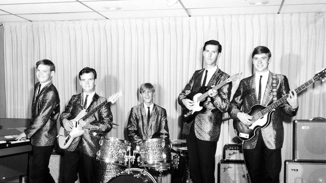The Outcasts smile for the camera in a mid-’60s promotional photograph.