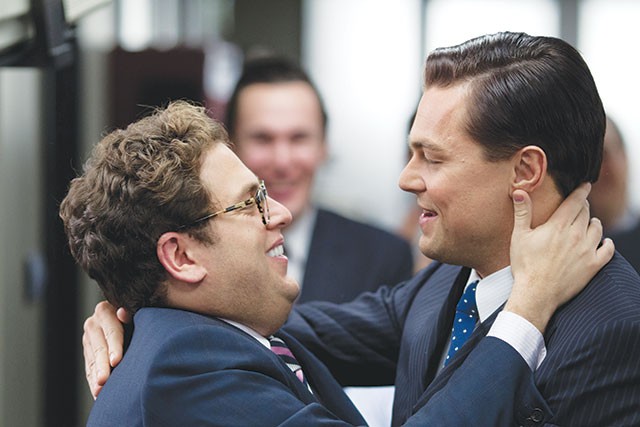 Donnie Azoff (Jonah Hill, left), the first loser turned millionaire by Jordan Belfort (Leonardo DiCaprio) in 'The Wolf of Wall Street' - COURTESY PHOTO
