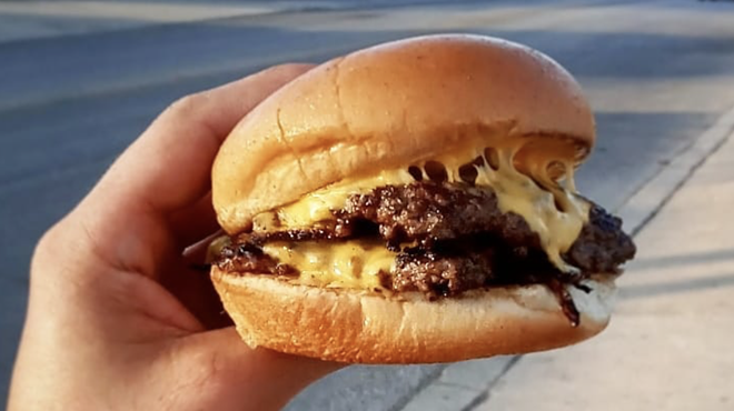 A Slam Daddy is a double cheeseburger, amped up with Chi Chi’s savory Bird Sauce.