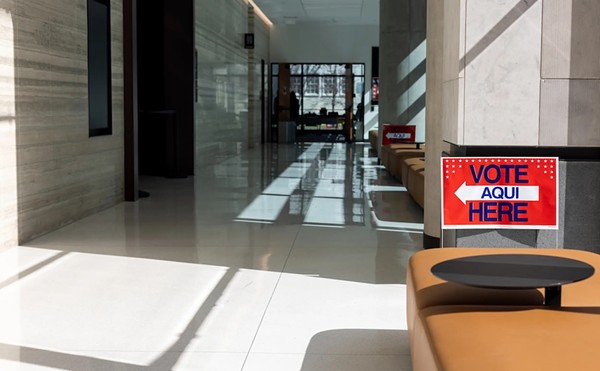 A 'vote here' sign is located inside of the Travis County Civil and Family Courts Facility on Mar. 1, 2024.