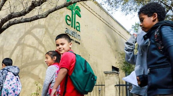 Children enter the Ella Austin Community Center in a photo taken prior to the pandemic.