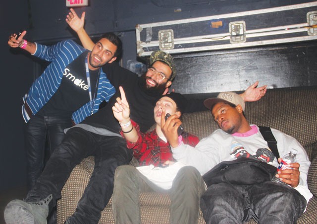Fan poses with Das Racist’s Victor Vasquez and guest rappers Lakutis and Houston’s Fat Tony. - Photos by Natalia Ciolko