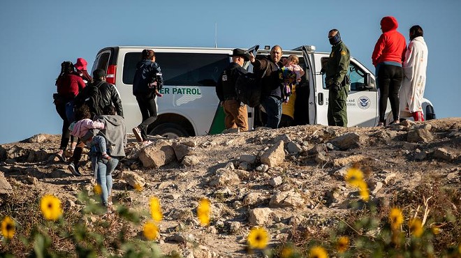 Migrants are picked up by Border Patrol after hundreds of people crossed the Rio Grande to seek asylum in the U.S. last week.