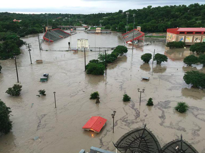 Flood waters north of downtown Austin. - VIA TWITTER USER @SIRDUKEOFTEXAS