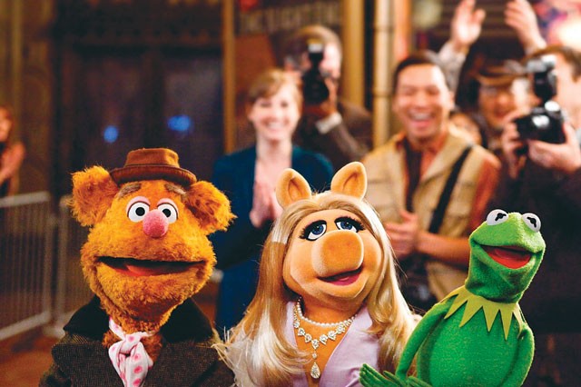 Fozzie Bear, Miss Piggy, and Kermit the Frog return to the big screen in The Muppets. - Courtesy photo