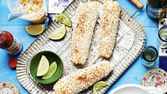 Roasted Mexican corn trimmed with queso fresco will be served at the 2022 Roasted Corn Festival.