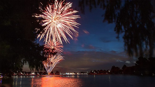 The free Independence Day celebration is capped off by fireworks above Woodlawn Lake.