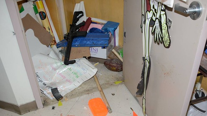 The gunman's AR-15 style rifle lays in a supply closet of Room 111 at Robb Elementary School.