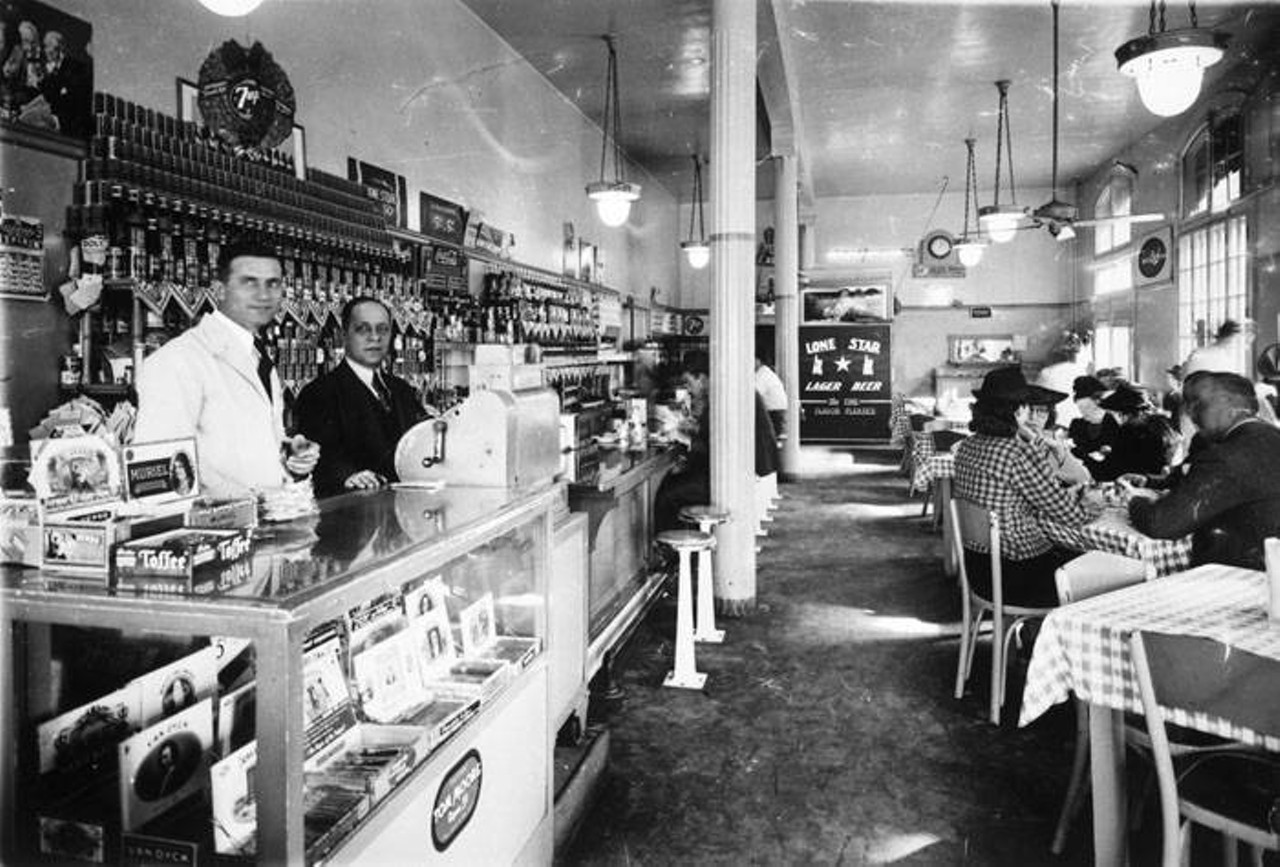 Prudential Cafe, 130 Main PlazaThe dining establishment shown in this 1939 photo was inside the Prudential Life Insurance Building on east side of Main Plaza. The space is now occupied by Tex-Mex eatery La Jalisco.