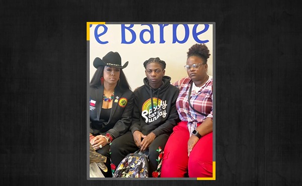 Darryl George with members of his family. The Barbers Hill school district has punished George for his hairstyle because it violates a dress code policy limiting the length of male students' hair.