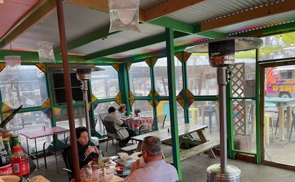 Customers dine in the enclosed portion of Lala's Gorditas.