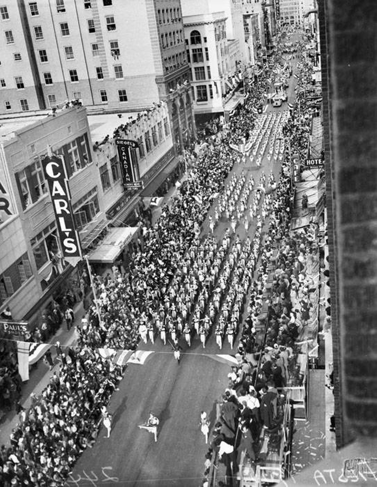 1940 Battle of Flowers Parade participants on Houston Street
An aerial view of the Battle of Flowers Parade coming down Houston Street.