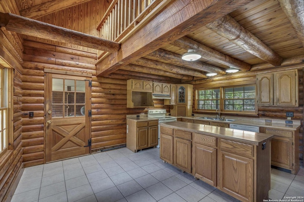 Log cabin in SA with 10 acres and private creek
