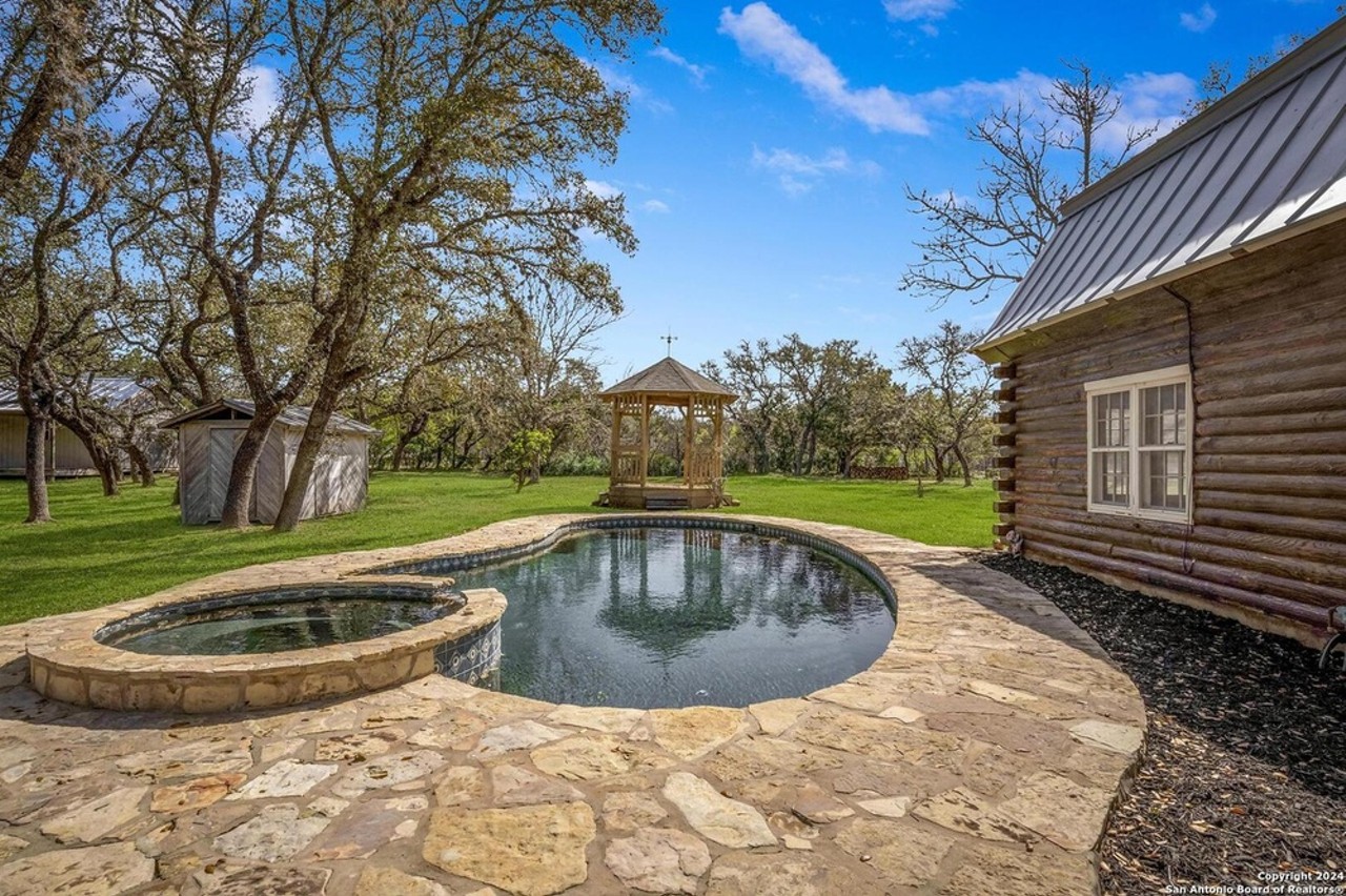 Log cabin in SA with 10 acres and private creek