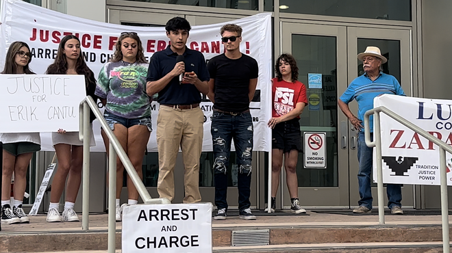 James Ramos, a friend of Erik Cantu, speaks to protesters earlier this month in front of the San Antonio Police Department's headquarters.