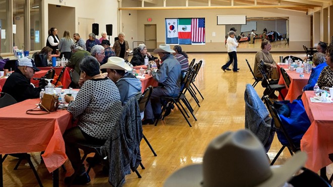 Older Dallas residents eat and dance at the Jaycee-Zaragoza Recreation Center in West Dallas on Nov. 4, 2021.