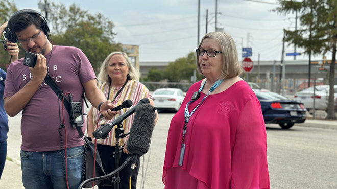 Bexar County Elections Administrator Jacque Callanen speaks to reporters half-way through the first day of early voting on Oct. 24.