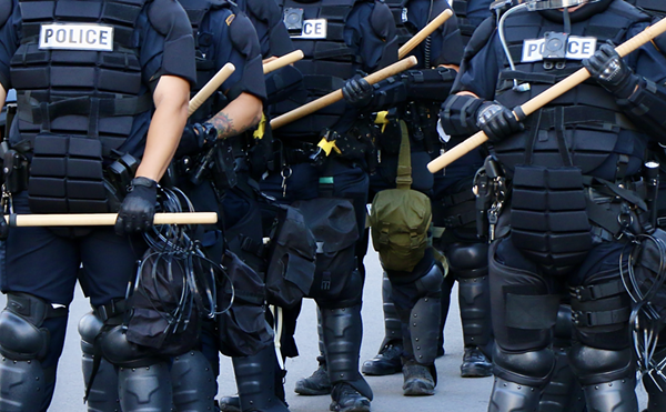 San Antonio Police in riot gear stand at the ready during the George Floyd protests in San Antonio in 2020.