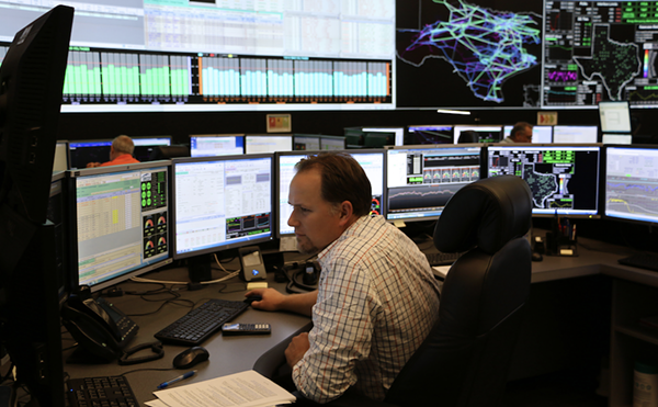 An ERCOT employee monitors the state's electrical grid.