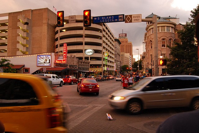 Cars pass through a downtown intersection. - VIA FLICKR USER LEARNINGLARK