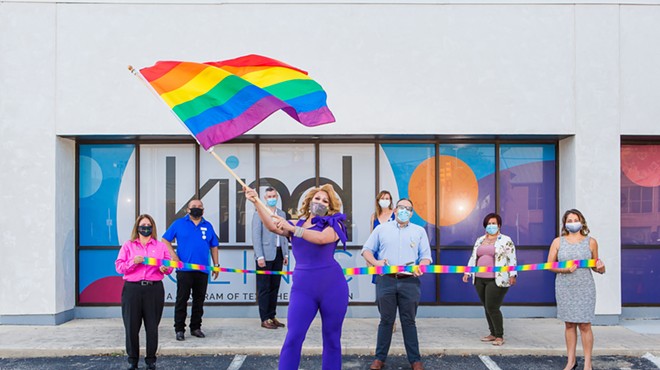 Drag queen Kristi Waters celebrates the grand opening of Kind Clinic.