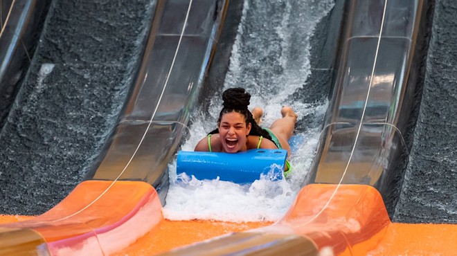 Singer songwriter Jordin Sparks rides the Cheetah Mat Racer maskless in a promo photo for the new indoor water park.